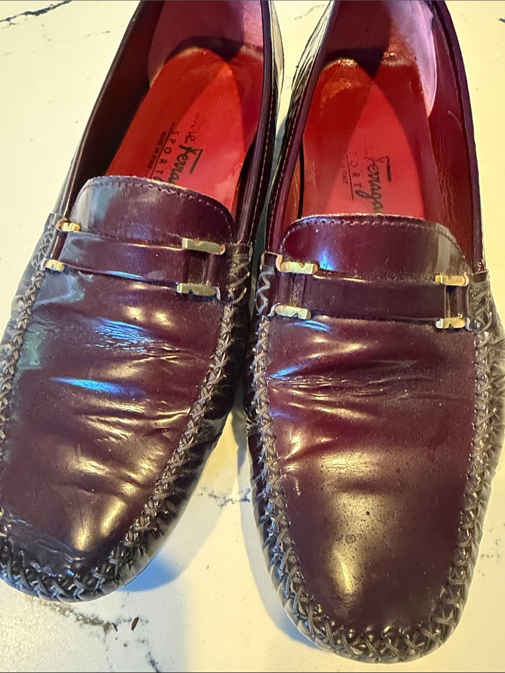 Salvatore Ferragamo Women's Wine Leather Loafers with Gold Accent